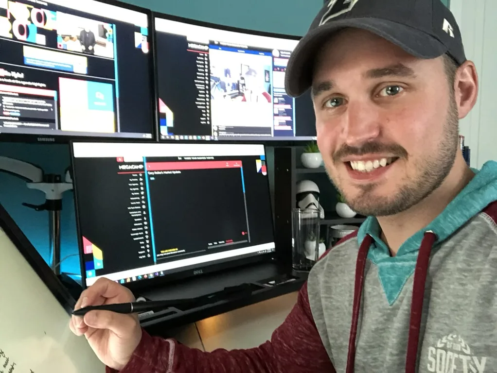 Kyle walking through an on-screen workflow at his desk